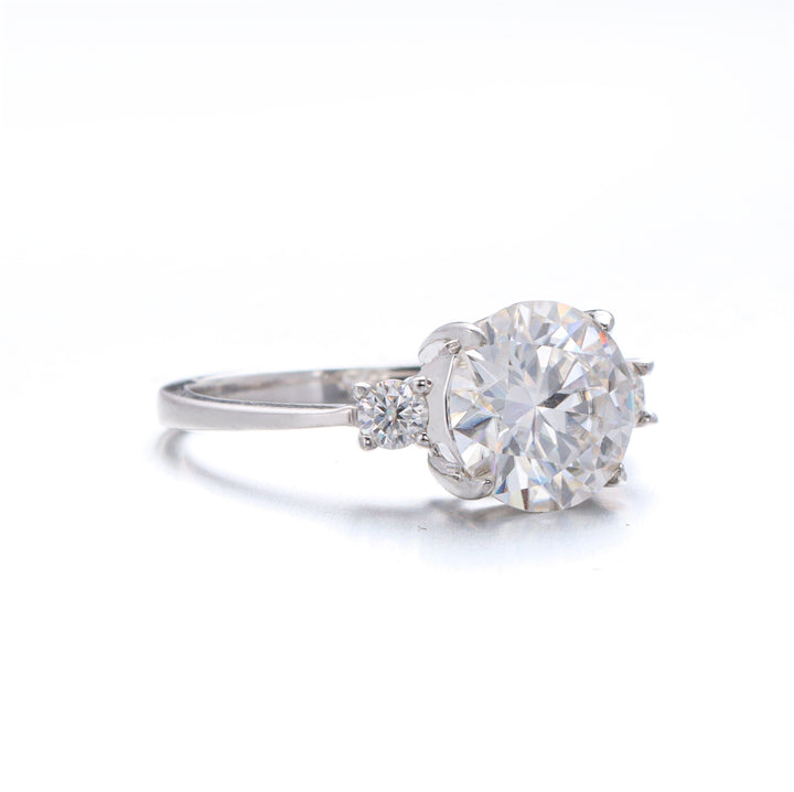 Celestia Three Stone Round Cut Moissanite Ring