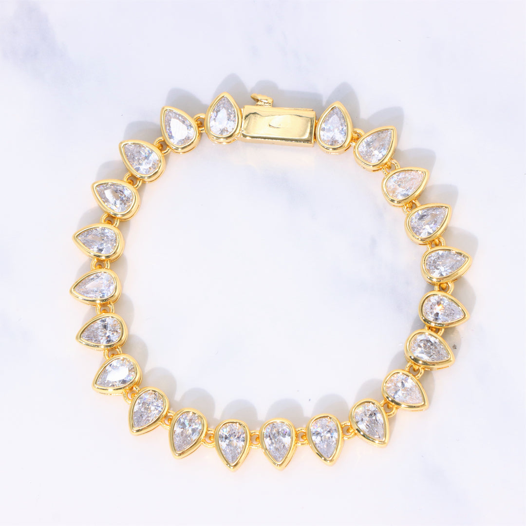 Women's Pear Cut Bezel Tennis Bracelet in Gold