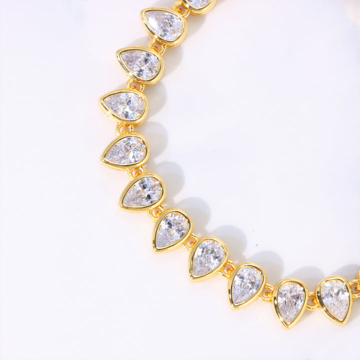 Women's Pear Cut Bezel Tennis Bracelet in Gold