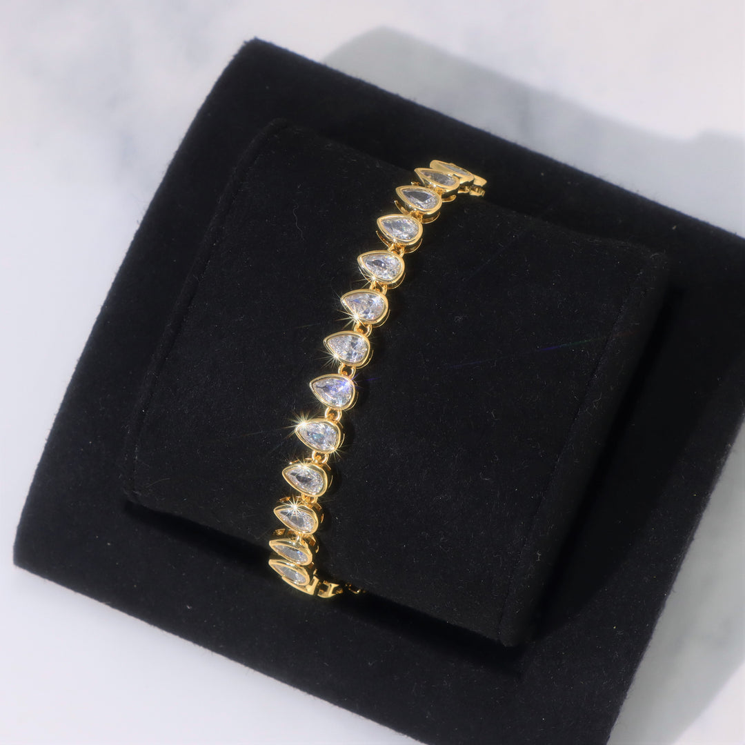 Women's Pear Cut Bezel Tennis Bracelet in Gold