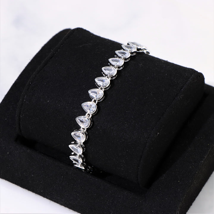 Women's Pear Cut Bezel Tennis Bracelet in White Gold