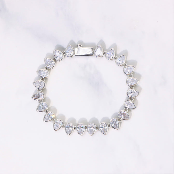 Women's Pear Cut Bezel Tennis Bracelet in White Gold