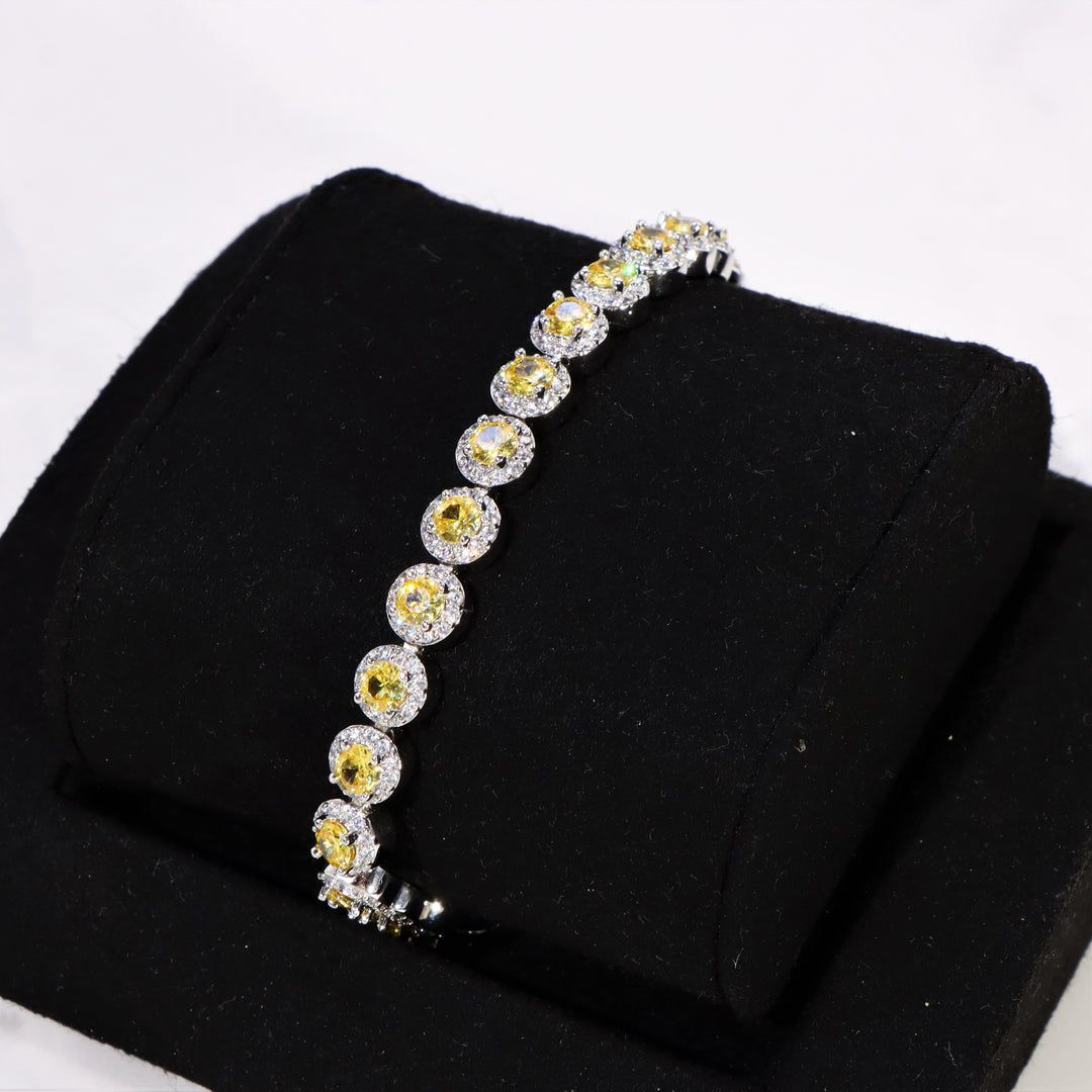 Women's Round Cut Yellow Clustered Tennis Bracelet White Gold