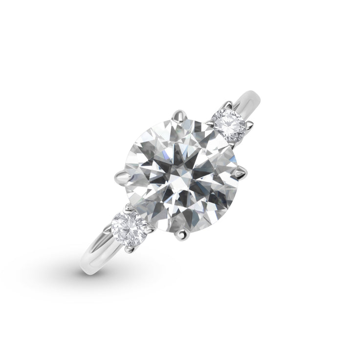 Celestia Three Stone Round Cut Moissanite Ring