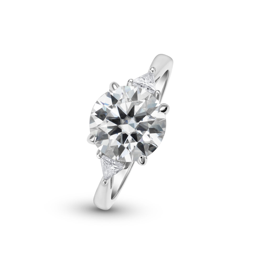 Tria Three Stone Round Cut Moissanite Ring