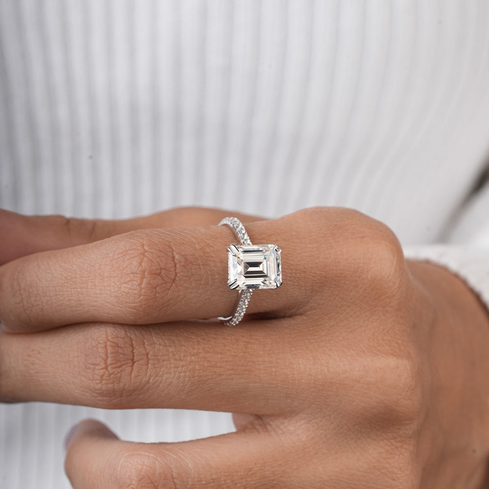 Adorned Emerald Cut Moissanite Ring in Sterling Silver