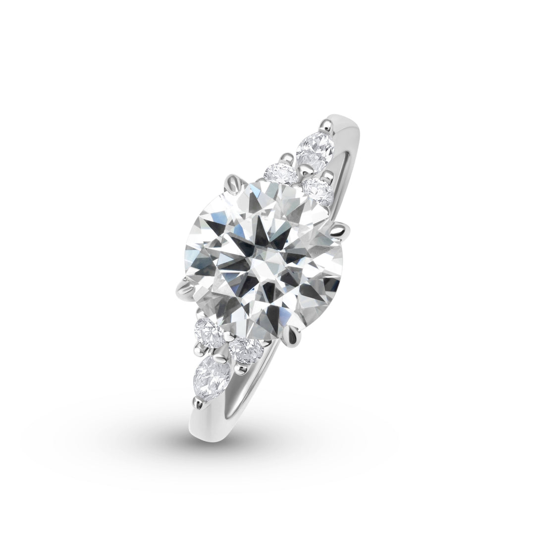 Luxe Three Stone Round Cut Moissanite Ring in Sterling Silver