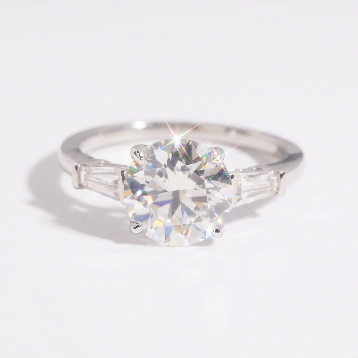 Round Cut Moissanite Engagement Ring in Three Stone Setting