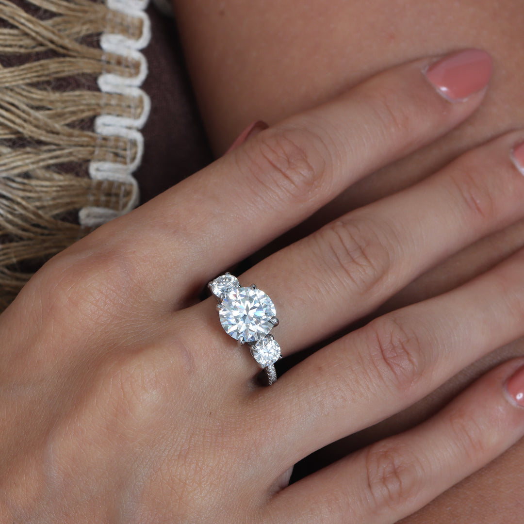 Adorned Celestia Three Stone Round Cut Moissanite Ring