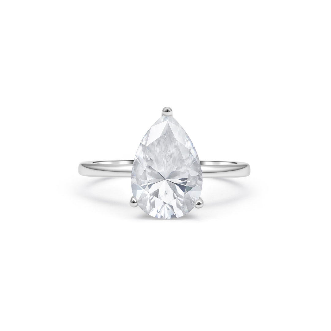 Three-Prong Solitaire Pear Cut Moissanite Ring