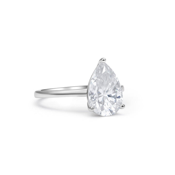 Three-Prong Solitaire Pear Cut Moissanite Ring