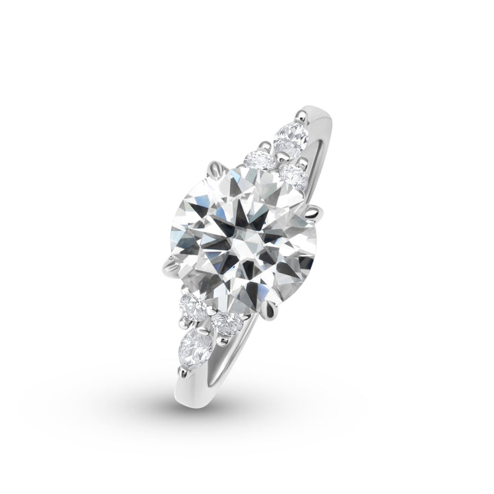 Luxe Three Stone Round Cut Moissanite Ring in Sterling Silver